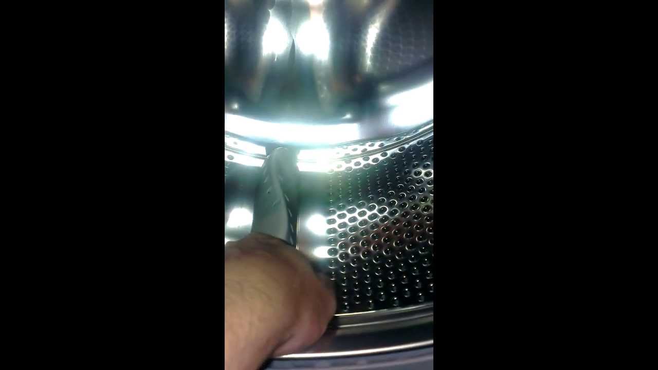 Попадание постороннего предмета под барабан стиральной машины
